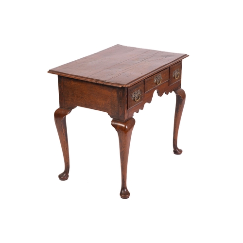 1241 - A George III and later oak kneehole lowboy with three short drawers and cabriole legs fore and aft. ... 