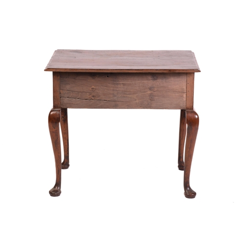 1241 - A George III and later oak kneehole lowboy with three short drawers and cabriole legs fore and aft. ... 