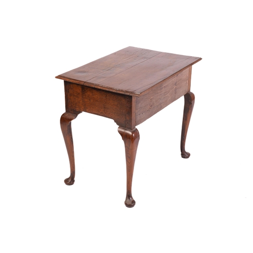 1241 - A George III and later oak kneehole lowboy with three short drawers and cabriole legs fore and aft. ... 