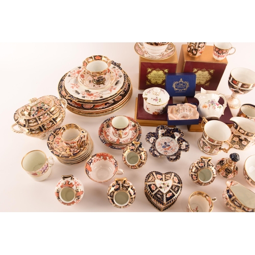 1263 - A large collection of Royal Crown Derby Imari pattern wares, comprising cups, saucers plates, a lidd... 