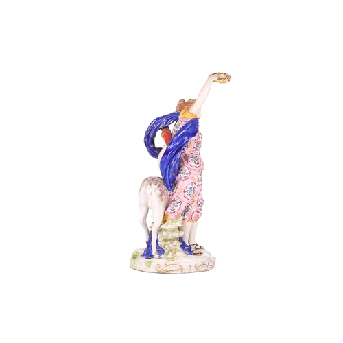 1266 - An 18th-century Derby porcelain figure of a triumphant Diana the huntress accompanied by an attentiv... 