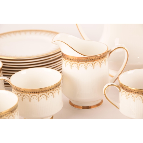 1269 - A Paragon Athena pattern tea service, seats twelve, comprising of teacups and saucers, small plates,... 