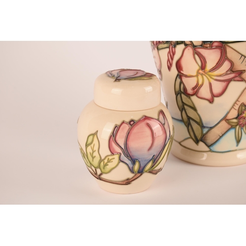 1278 - A Moorcroft pink floral vase on a white ground, together with a small lidded ginger jar of the same ... 