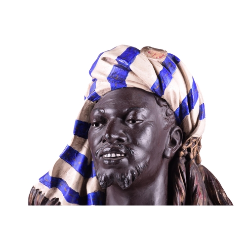 1251 - A contemporary Goldscheider-style composition bust titled 'Marokko' of a Berber tribesman in colourf... 