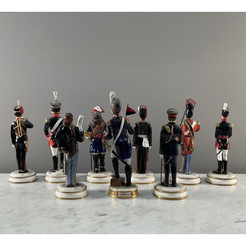 1293 - A collection of Michael Sutty porcelain figures detailing the change in Artillery uniforms over time... 