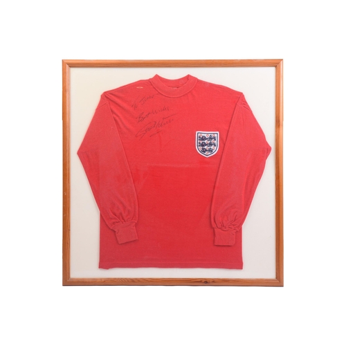 1310 - A collection of football memorabilia, comprising a Sir Geoff Hurst signed replica England football s... 