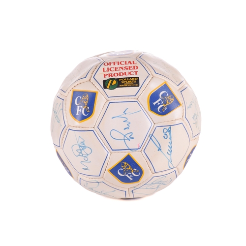 1310 - A collection of football memorabilia, comprising a Sir Geoff Hurst signed replica England football s... 