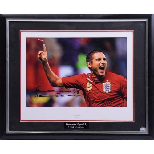 1310 - A collection of football memorabilia, comprising a Sir Geoff Hurst signed replica England football s... 