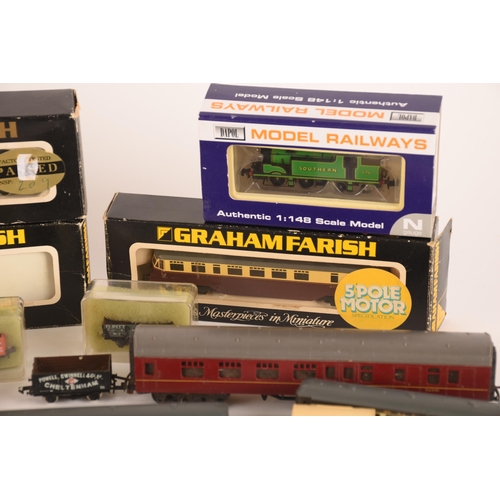 1313 - A collection of 1:148 miniture railway models comprising three Dapol locomotives, a Grafar locomotiv... 