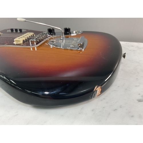 1317 - A Fender Jaguar electric guitar serial number MX15577113, being Mexican made and having three tone s... 