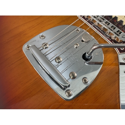 1317 - A Fender Jaguar electric guitar serial number MX15577113, being Mexican made and having three tone s... 