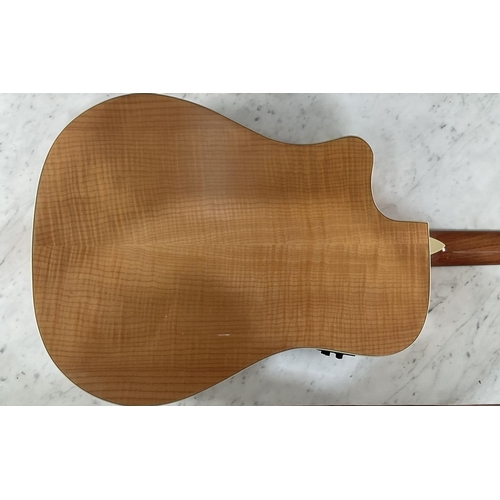 1320 - A Fender T-Bucket 400CE electric- acoustic guitar serial number CSJ11002195 having natural finish fl... 