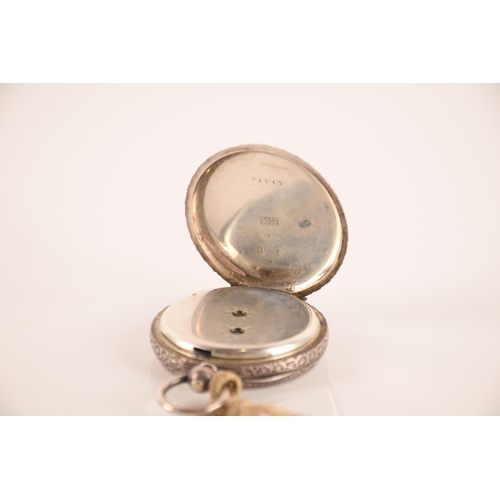 1333 - A selection of silver items including, a box of four napkin rings dated 1925, a further napkin ring ... 