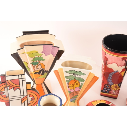 100 - After Clarice Cliff; a collection of ceramic items of various makers such as Old Tuptonware, Vicary ... 