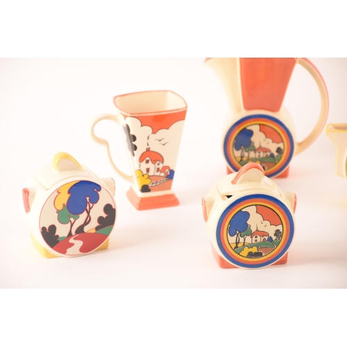 103 - After Clarice Cliff; a collection of ceramics stamped Chelsea Works Burslem comprising two teapots, ... 