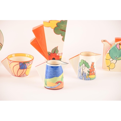 111 - After Clarice Cliff; a collection of ceramics, the majority stamped Wedgwood Clarice Cliff collectio... 