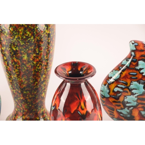 114 - Anita Harris; a collection of ceramics comprising of four vases of varying sizes, shapes and pattern... 