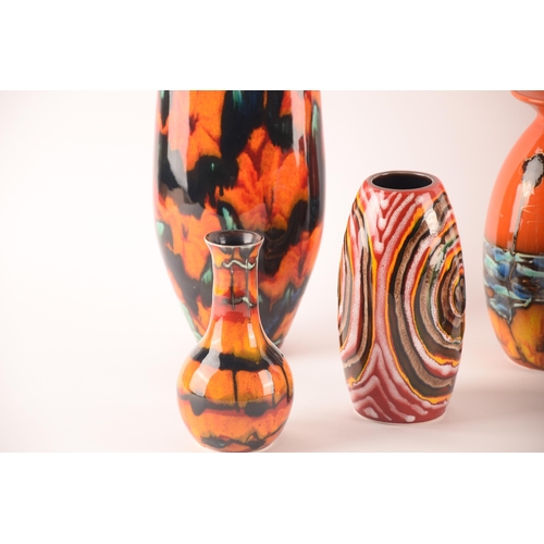 116 - Anita Harris; a collection of ceramics comprising seven vases of varying sizes, shapes and patterns,... 