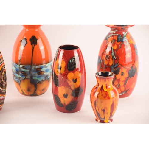 116 - Anita Harris; a collection of ceramics comprising seven vases of varying sizes, shapes and patterns,... 