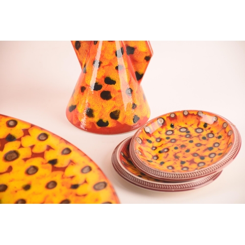 118 - Anita Harris; a collection of ceramics comprising four vases of varying size, shape and pattern, a c... 