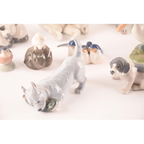 119 - A collection of seventeen Royal Copenhagen ceramic animals comprising various dogs, sheep, bears and... 