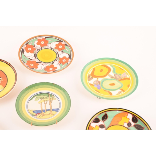 122 - After Clarice Cliff; a collection of seven Wedgwood decorative plates comprising two from the Birth ... 