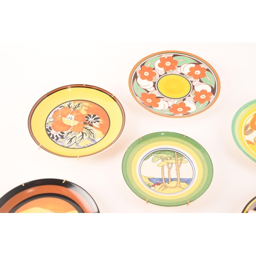 122 - After Clarice Cliff; a collection of seven Wedgwood decorative plates comprising two from the Birth ... 