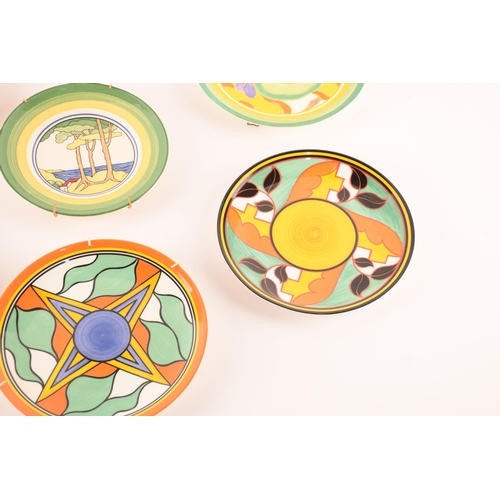 122 - After Clarice Cliff; a collection of seven Wedgwood decorative plates comprising two from the Birth ... 