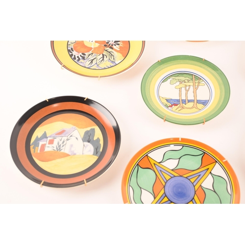 122 - After Clarice Cliff; a collection of seven Wedgwood decorative plates comprising two from the Birth ... 