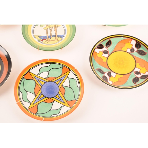 122 - After Clarice Cliff; a collection of seven Wedgwood decorative plates comprising two from the Birth ... 