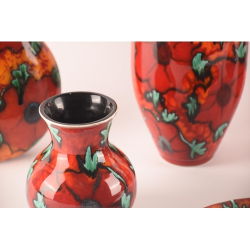 123 - Anita Harris; a collection of ceramics comprising six vases of different sizes and shapes and a furt... 