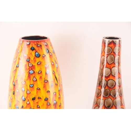 125 - Anita Harris; a collection of ceramics comprising two large vases of varying size, shape and pattern... 