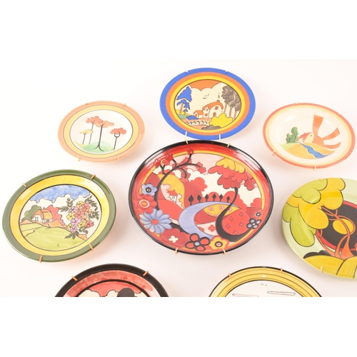 126 - After Clarice Cliff; a collection of various decorative plates by various makers comprising Vicary W... 