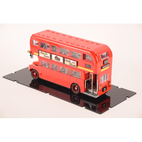 150 - A pre constructed Lego London bus together with a pre constructed Lego London skyline, both in custo... 