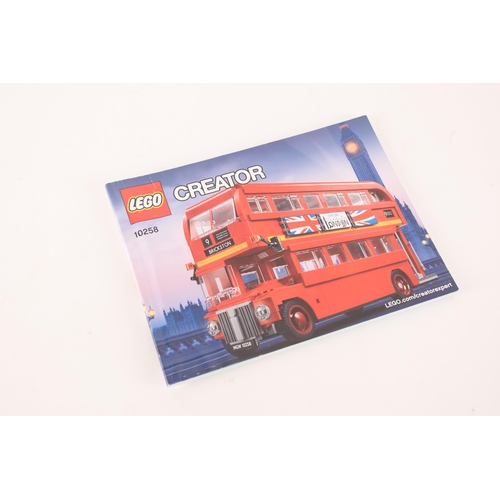 150 - A pre constructed Lego London bus together with a pre constructed Lego London skyline, both in custo... 