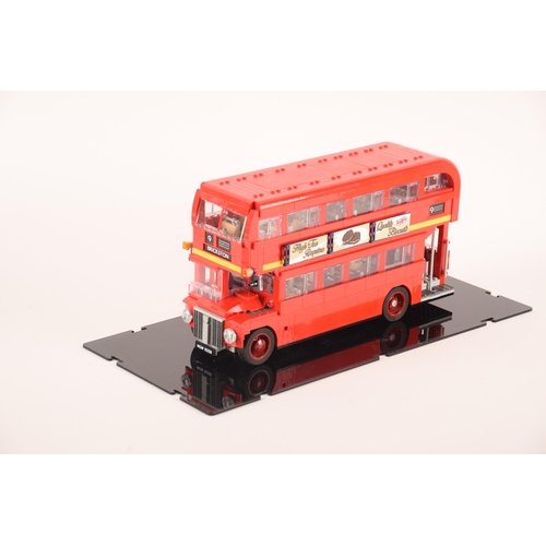 150 - A pre constructed Lego London bus together with a pre constructed Lego London skyline, both in custo... 