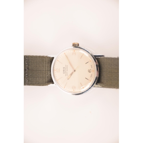 160 - An Oris 1960s gentleman's manual wind wristwatch, having cream dial with batton numerals and Arabic ... 