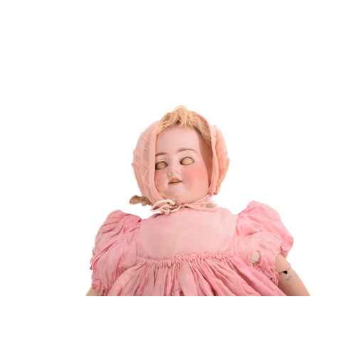 140 - An Armand Marseille 1894 DEP porcelain-headed doll with an open mouth and sleeping eyes with a compo... 