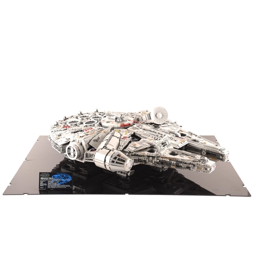 144 - A very large and impressive pre built Lego Starwars Millennium Falcon, together with custom display ... 