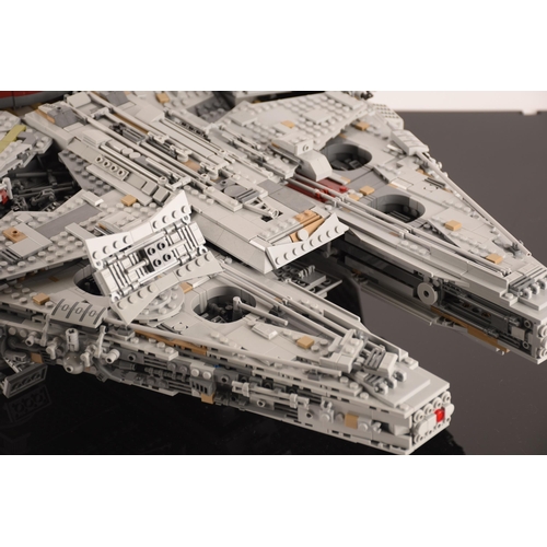 144 - A very large and impressive pre built Lego Starwars Millennium Falcon, together with custom display ... 