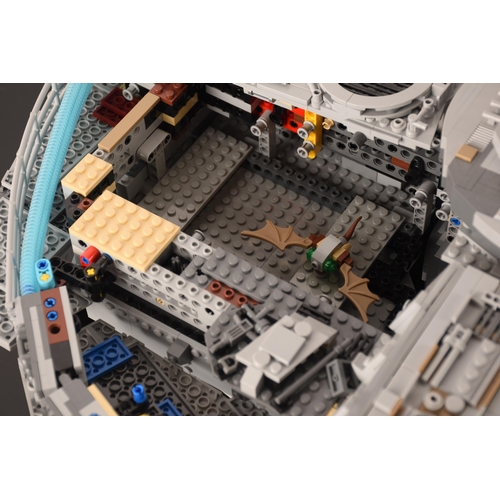 144 - A very large and impressive pre built Lego Starwars Millennium Falcon, together with custom display ... 