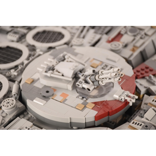 144 - A very large and impressive pre built Lego Starwars Millennium Falcon, together with custom display ... 