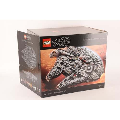 144 - A very large and impressive pre built Lego Starwars Millennium Falcon, together with custom display ... 