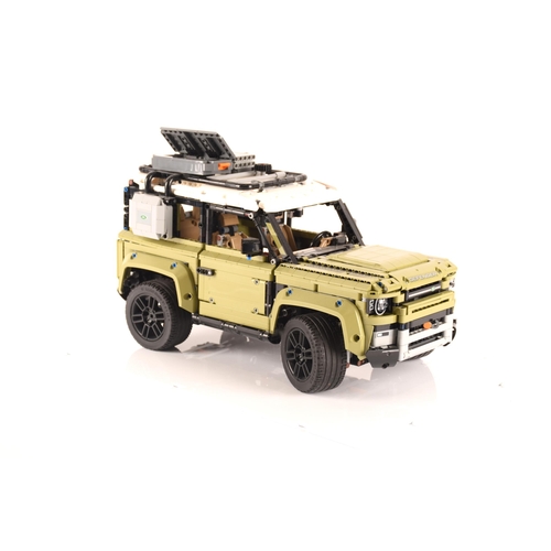 145 - A large and impressive Lego Land Rover Defender, having various moveable mechanics including model e... 