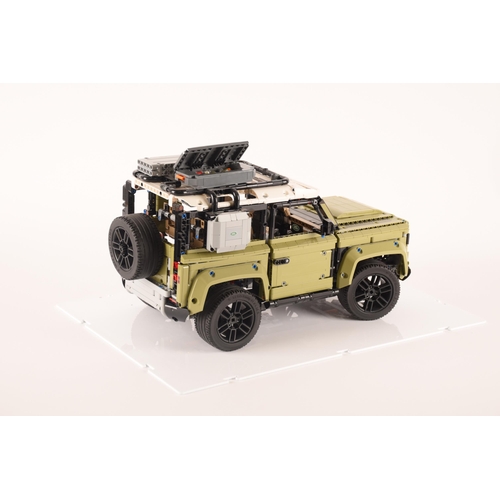 145 - A large and impressive Lego Land Rover Defender, having various moveable mechanics including model e... 