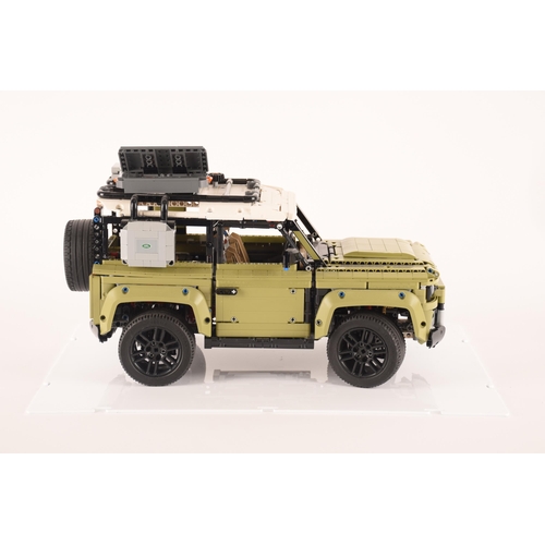 145 - A large and impressive Lego Land Rover Defender, having various moveable mechanics including model e... 