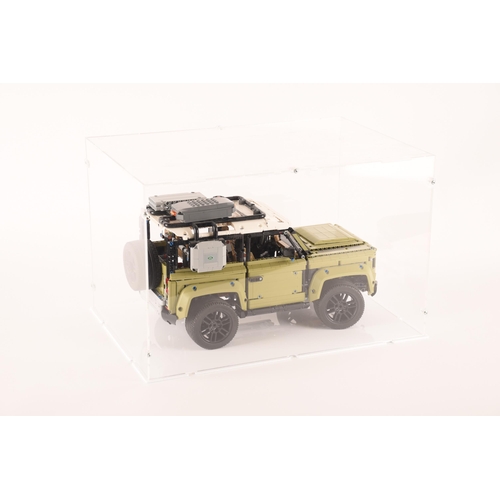 145 - A large and impressive Lego Land Rover Defender, having various moveable mechanics including model e... 