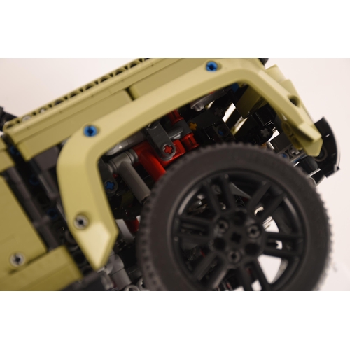 145 - A large and impressive Lego Land Rover Defender, having various moveable mechanics including model e... 