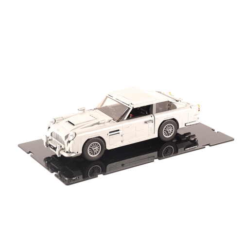 147 - A pre constructed Lego Aston Martin DB5 in custom made display case, 30 x 10cm not including case. I... 