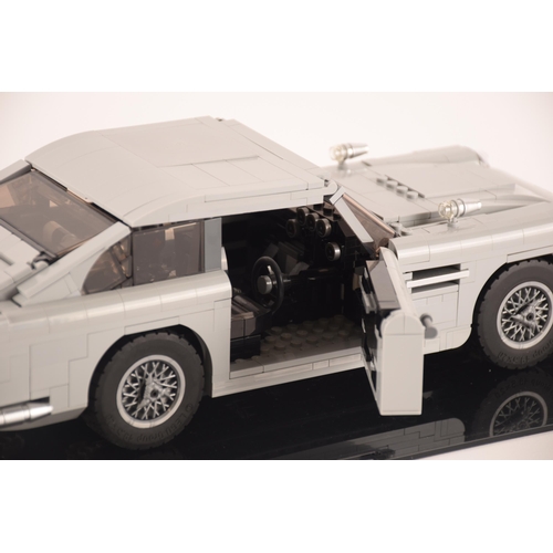 147 - A pre constructed Lego Aston Martin DB5 in custom made display case, 30 x 10cm not including case. I... 